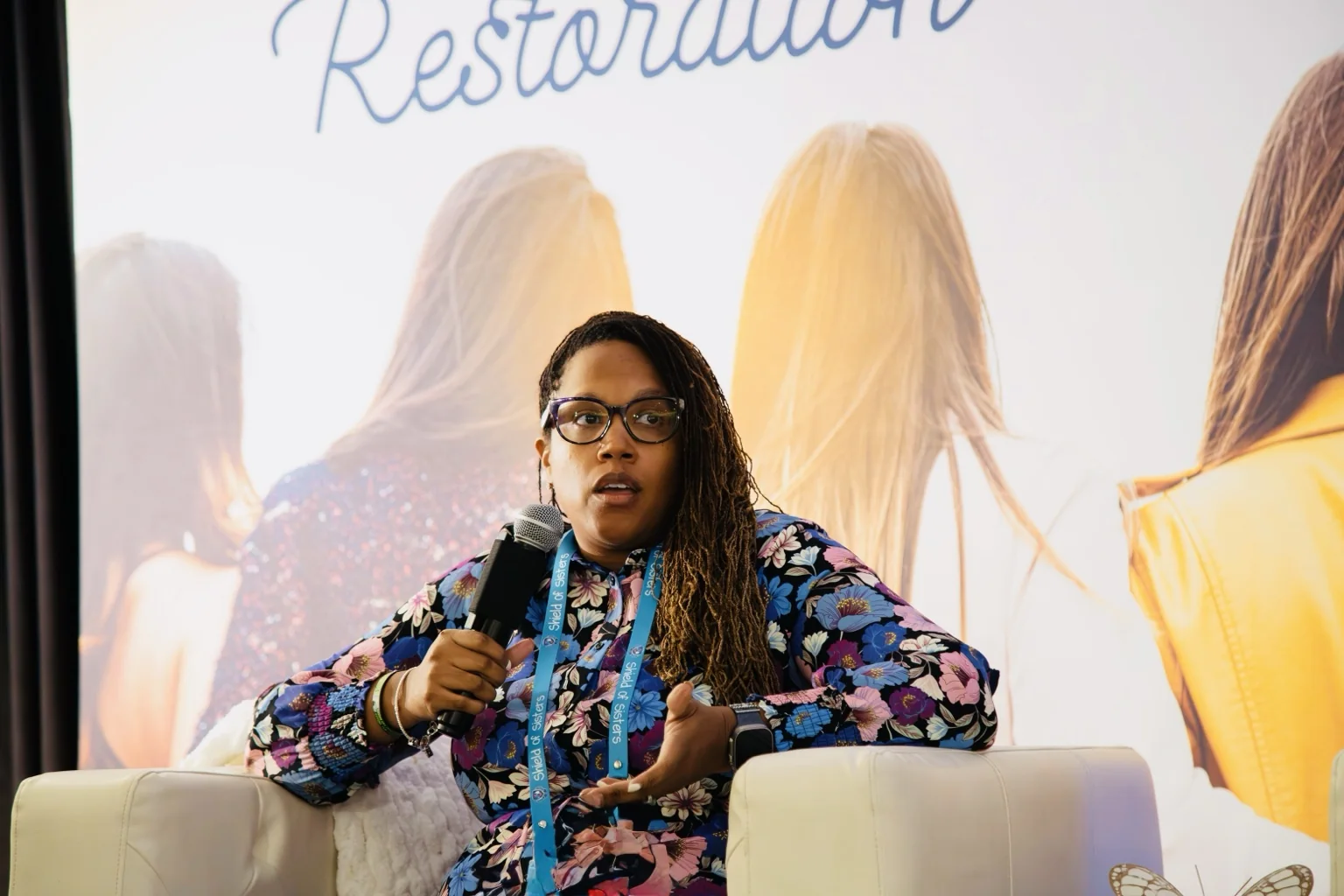 Jasmine speaking on a panel