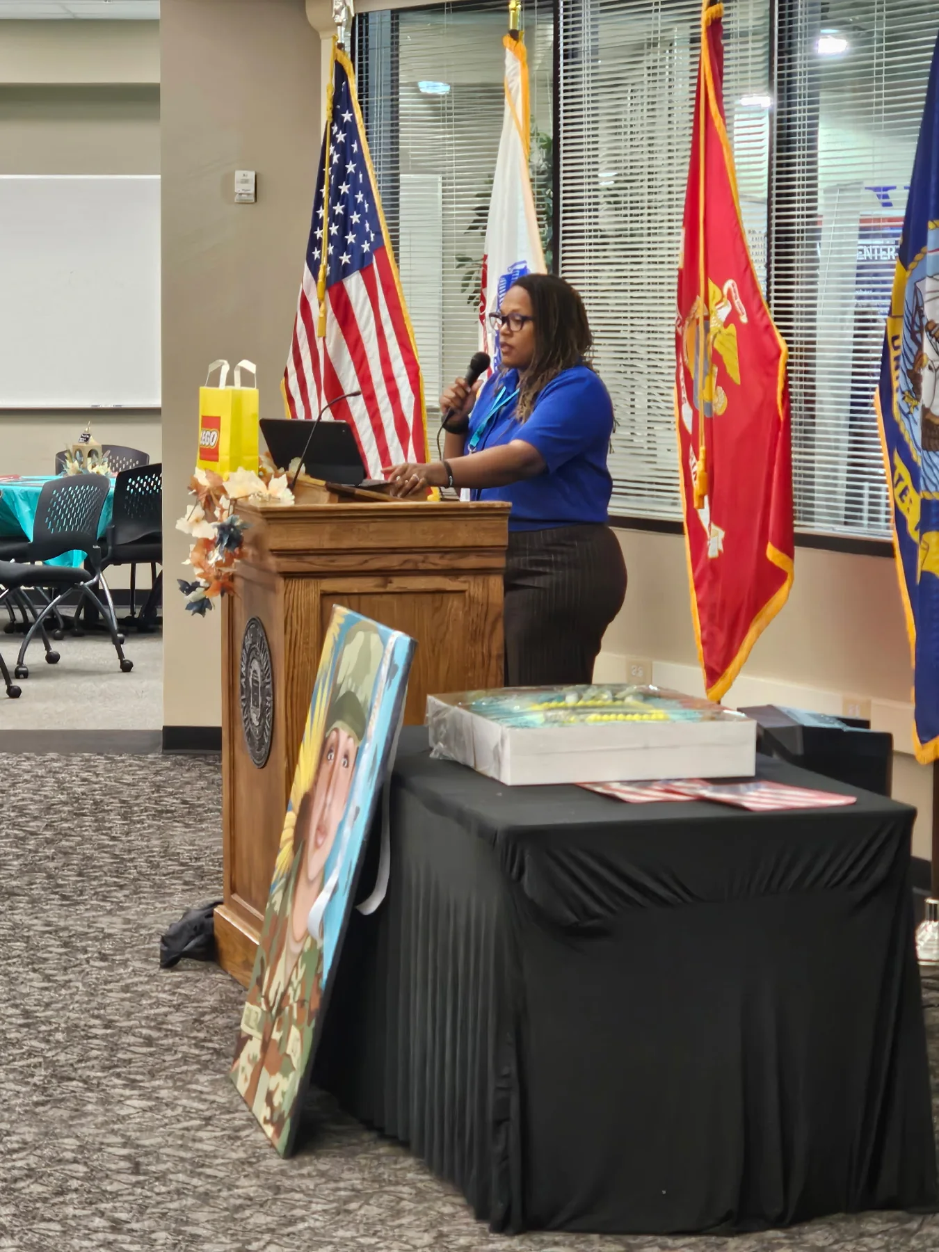 Jasmine speaking at an event